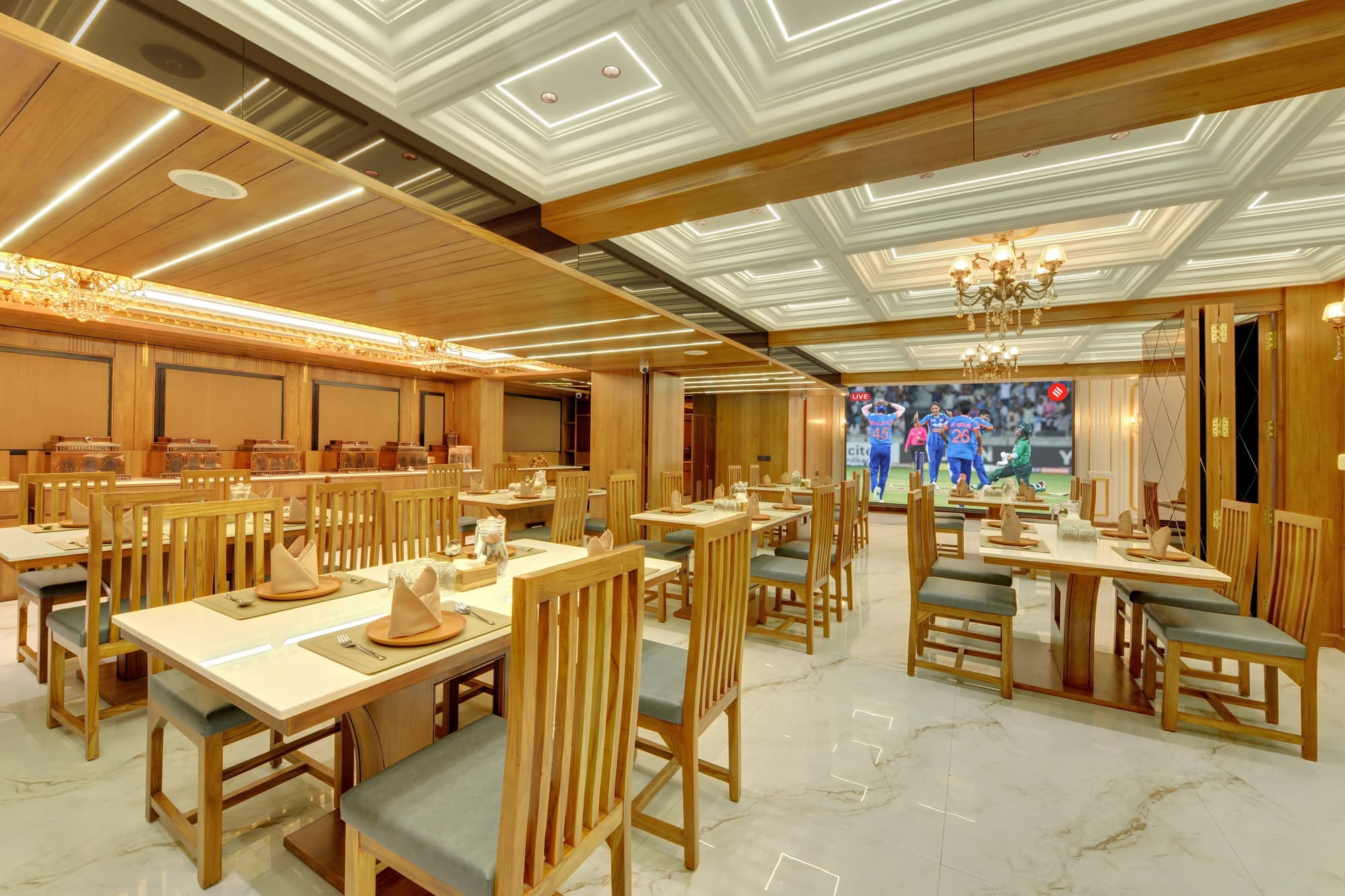 Hotel Shital Inn restaurant dining area with arranged tables