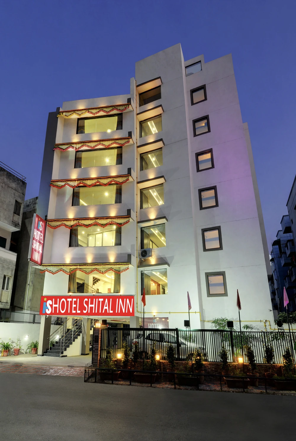 Hotel Shital Inn illuminated exterior at night